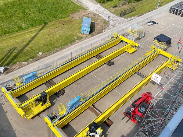 Progress at Soenen Golfkarton: Massive CTI bridge cranes installed for automated stacking warehouse