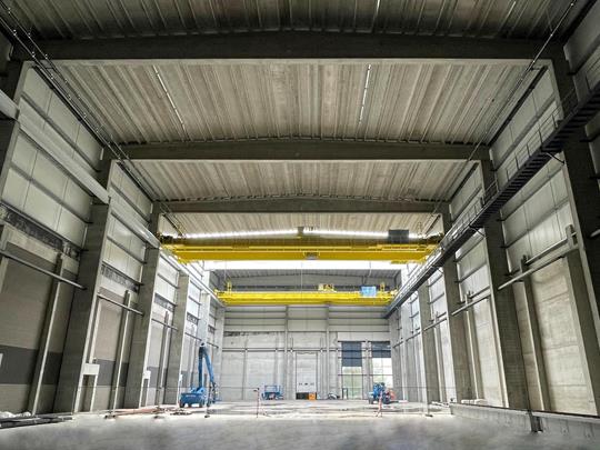 Progress at Soenen Golfkarton: Massive CTI bridge cranes installed for automated stacking warehouse